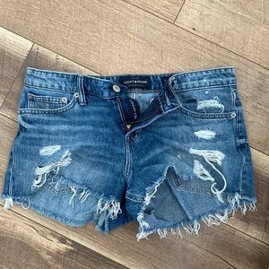 Distressed denim shorts